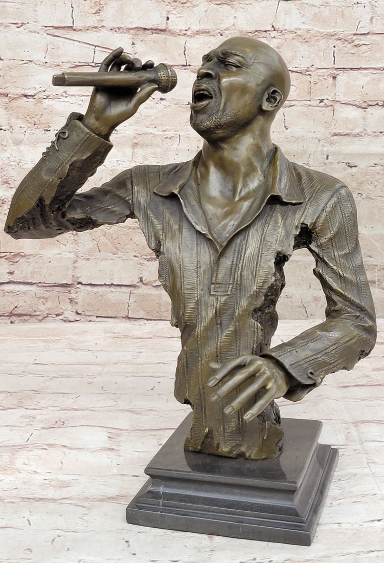 American Artist Singer Bronze Sculpture: Singers everywhere will love this lovely Singer Figurine. This detailed design features a singer Rockin out to his favorite rock song. A great hot cast chilling piece for the music studio, bedroom,