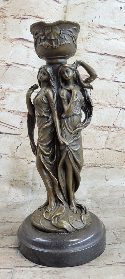 Twin Sister Candle Holder Bronze Sculpture: Gorgeous art deco style bronze casting of a pair of sexy girl candle holders Like a pair of Siamese twins, the girls are in typical deco symmetrical fashion Stands in at just under 12 inches. This