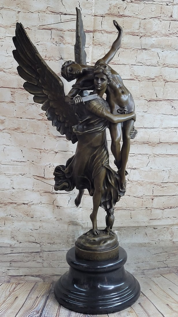 Elegant Bronze Statue: Replicas of this 1872 bronze statue. Gloria Victis by Antonin Merci were used on monuments in many French towns to honor fallen heroes from the Franco-Prussian War of 1870. Gloria Victis means Glory t