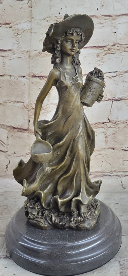 Souther Girl In Garden Bronze Statue: The young girl can be imagined walking around her garden in the early morning sunlight exercising her green thumb. Her sundress wraps around her, pulled back by the wind, as her eyes face the ground