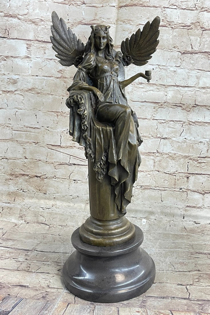 Egyptian Goddess Bronze Sculpture: Sitting proudly regally inside her palace with images of the goddess at her mirror, Cleopatra, who became queen of Egypt at 17, is depicted with the legendary bearing that still elevates her among