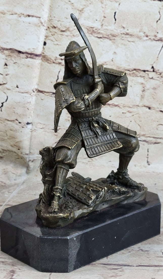 Japanese samurai Warrior Bronze Marble Sculpture: In the midst of battle, the only goal and mission of the samurai are to follow the ethic code of Bushido, the way of the warrior. The Japanese warrior holds a strong stance with his knees bent, his