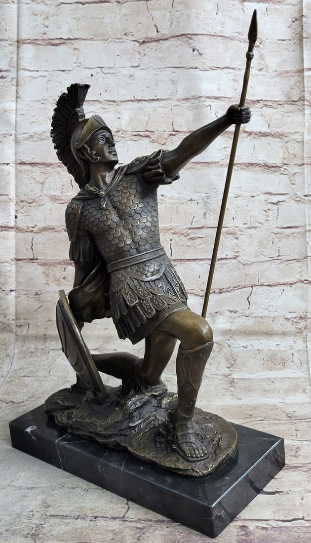 Roman Gladiator Bronze Sculpture: Roman Gladiator Bronze Sculpture on a marble base. Dimensions: Height 15 X Width 10 inches. Weight: 18 LBS.