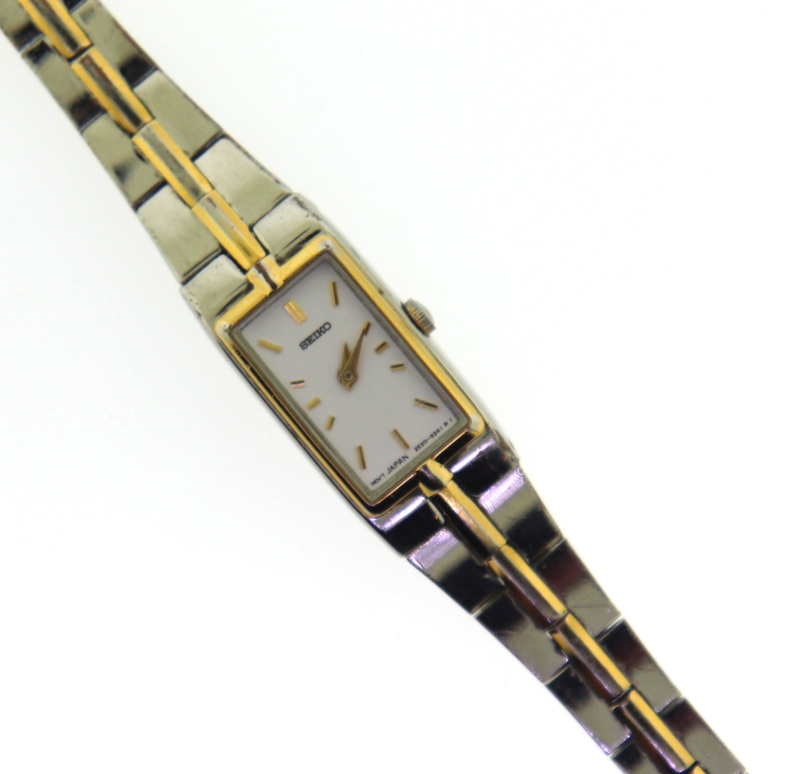 Vintage Seiko Woman's Watch: Vintage woman's Steel and gold-tone Seiko Bracelet watch. 2E20-7479. Size: 7.5.
