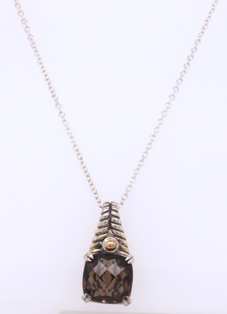Stylish Effy Smokey Quartz Sterling Silver Necklace: This Stylish 925 Sterling Silver Necklace designed by Effy features a Checkerboard Cut Smokey Quartz Pendant hung on a 20" Matine Length Chain Necklace.? This necklace weighs approx. 8.90 Grams.