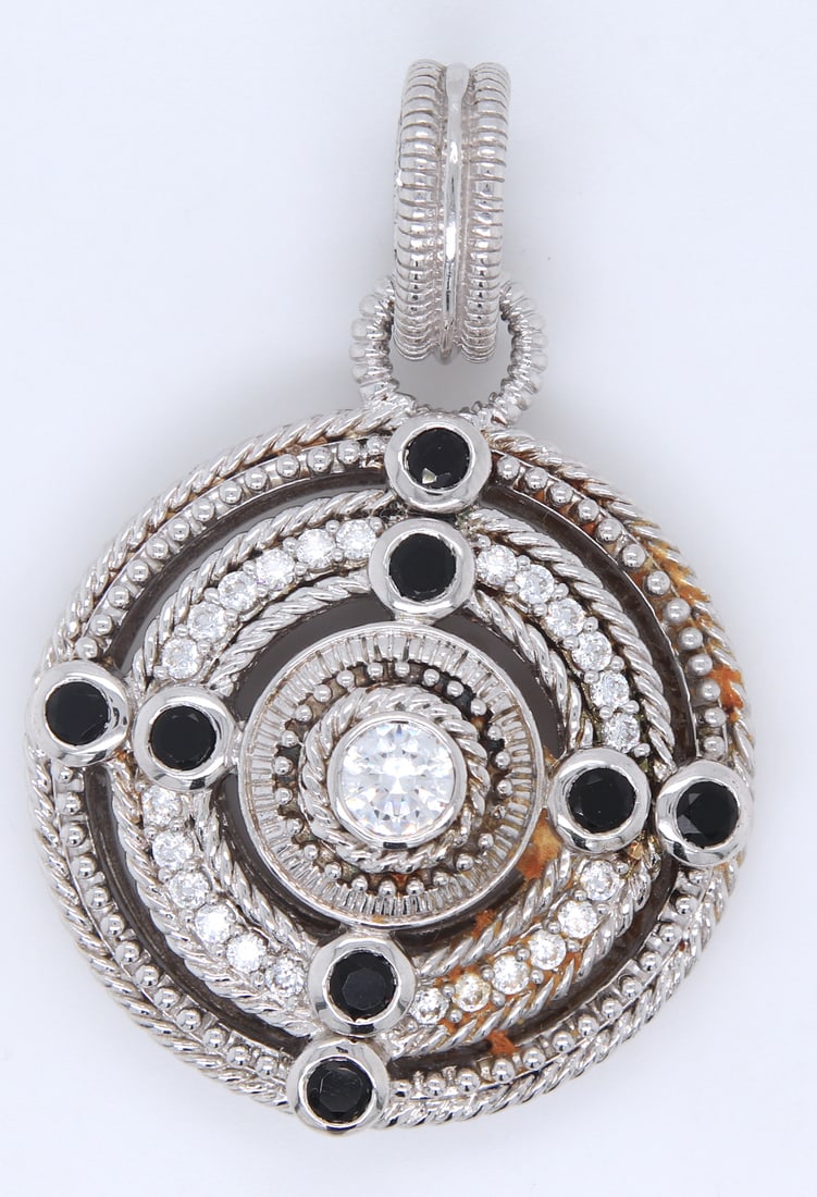Judith Ripka 925 sterling silver CZ and black onyx pendant: Judith Ripka 925 sterling silver CZ and black onyx pendant. Total weight of pendant 22.3 grams.