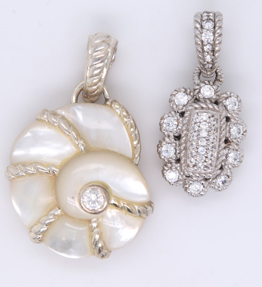 Lot of 2 Judith Ripka 925 sterling silver pendants: Lot of 2 Judith Ripka 925 sterling silver pendants. CZ pendant and mother of pearl pendant. Total weight of lot 22.4 grams.