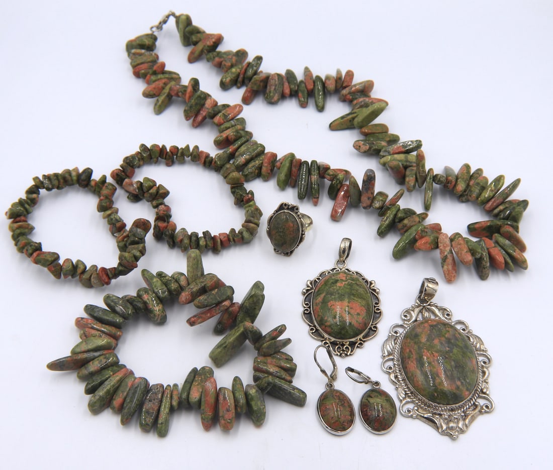 Lot of Unakite gemstone mixed jewelry: Lot of Unakite gemstone mixed jewelry in 925 sterling silver. Two pendants. Dangle earrings. 3 bracelets. 20 inches necklace and ring. Ring size 7". Total weight of lot 267.1 grams.