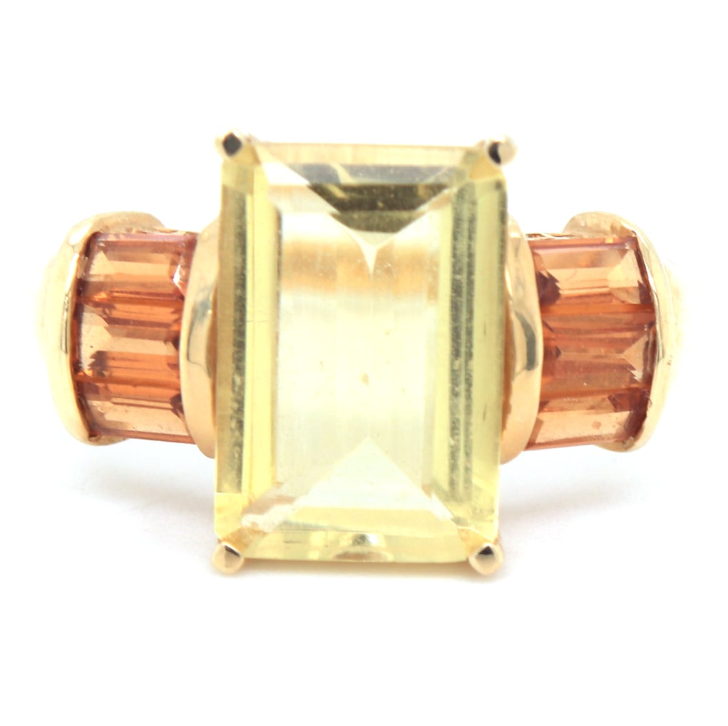14kt Yellow gold quartz and sapphire ring: 14kt Yellow gold quartz and sapphire ring. Total weight of ring 4.9 grams. Ring size 9.25"