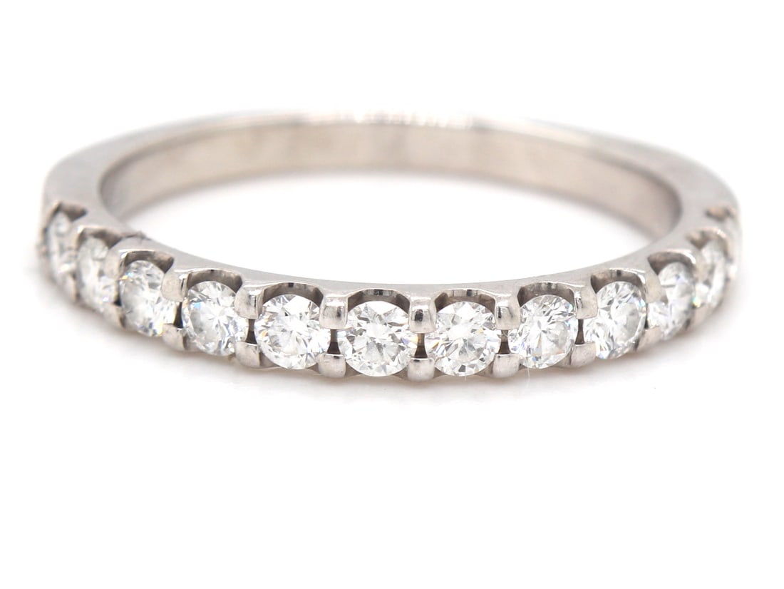 Platinum 0.60ctw diamond band: Platinum approximate 0.60ctw diamond band, Color G-H. Clarity VS. Total weight of band is 4.14 grams. Ring size 8.5"