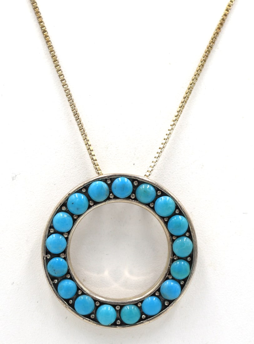 Vintage 925 sterling silver signed turquoise pendant on box chain: Vintage 925 sterling silver signed turquoise pendant on 18 inches box chain necklace. Total weight of necklace is 9.9 grams.