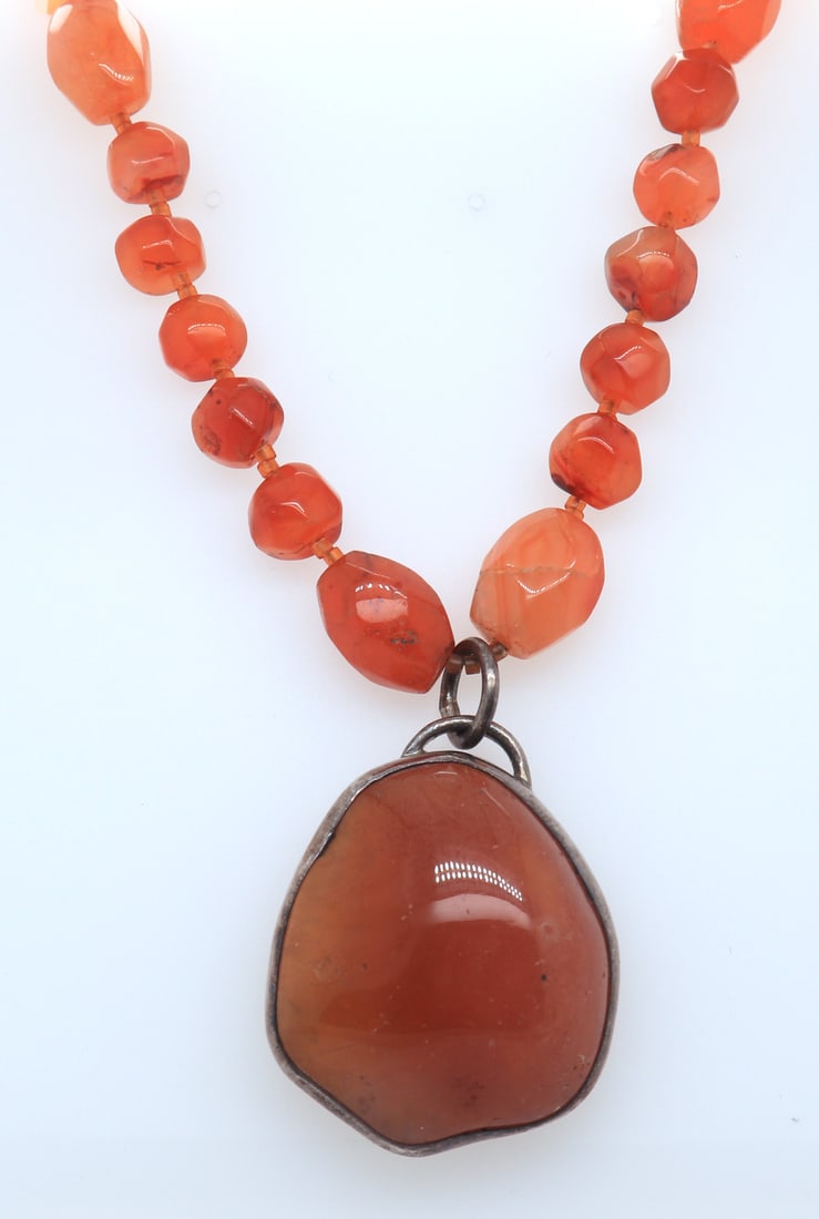 Sterling Silver Carnelia Pendant on Beads Necklace: 925 Sterling Silver Carnelia Pendant on 18-20 inches Beads Necklace. Total weight of Necklace 59.52 Grams.