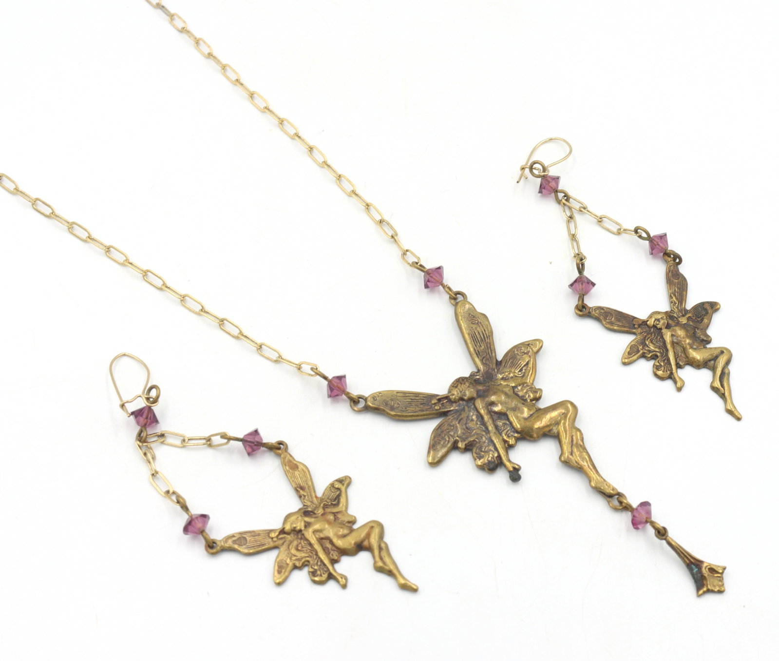 Set of Vintage brass Pididdly links fairy necklace and dangle earrings: Set of Vintage brass Pididdly links fairy 20 inches necklace and dangle earrings. Total weight of set is 15.6 grams.