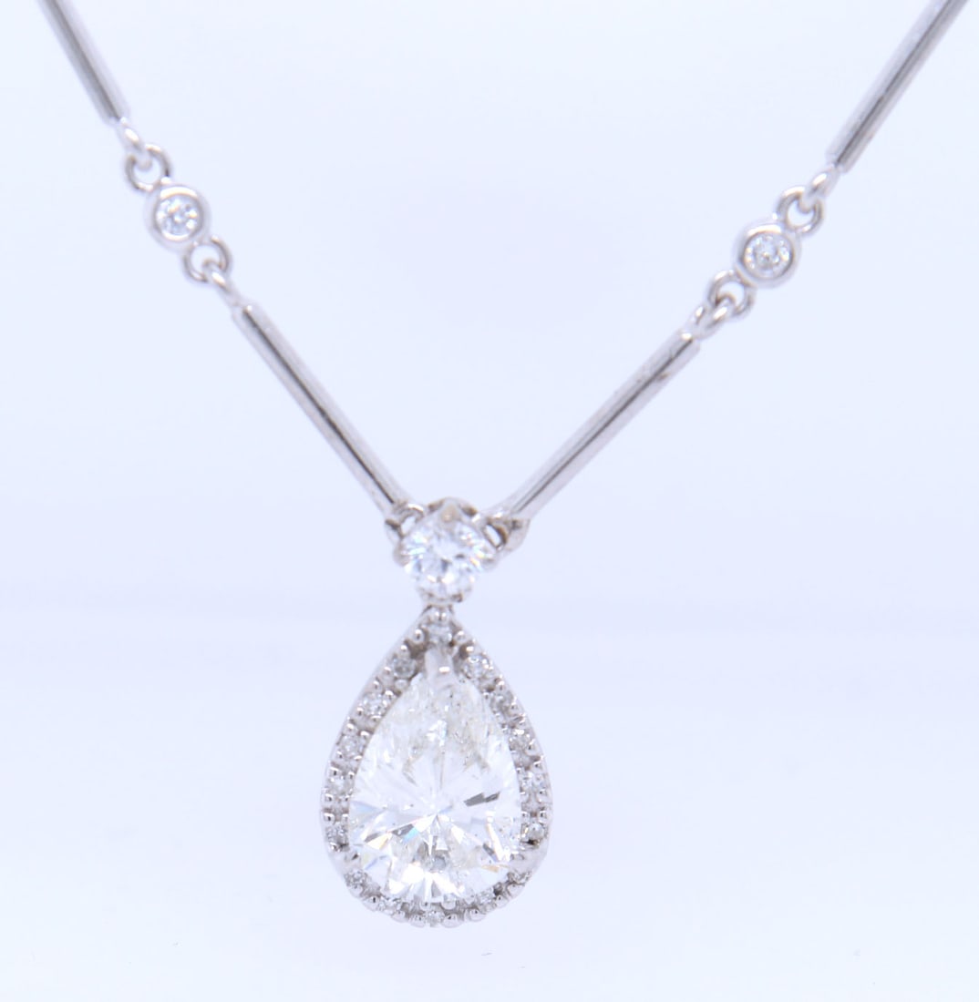 18kt White gold pear shaped laser treated in 0.75ctw bezel set diamond bar necklace