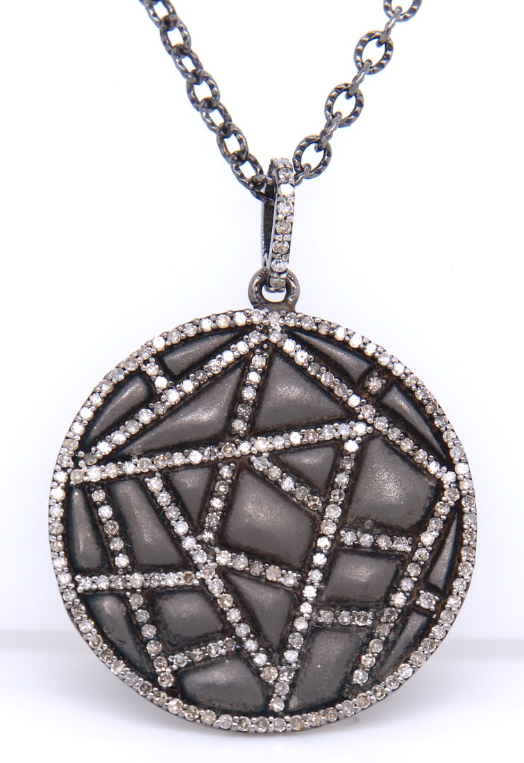 Silver Oxi Quilted Diamond Pendant on Chain: 925 Sterling Silver Oxi Quilted Diamond Pendant on 22 inches Chain Necklace. Total weight of Necklace 7.48 Grams.