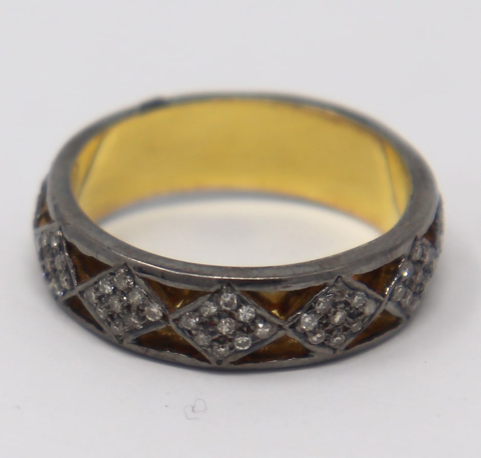 Edgy 925 Sterling Silver Oxidized Diamond Openwork Ring: This Edgy 925 Sterling Silver Ring features approx. 0.83CTW Round Brilliant Cut Diamonds fashioned into a Two-Tone Oxidized Ring. ?This ring is a size 6.5 and weighs approx. 2.83 Grams.