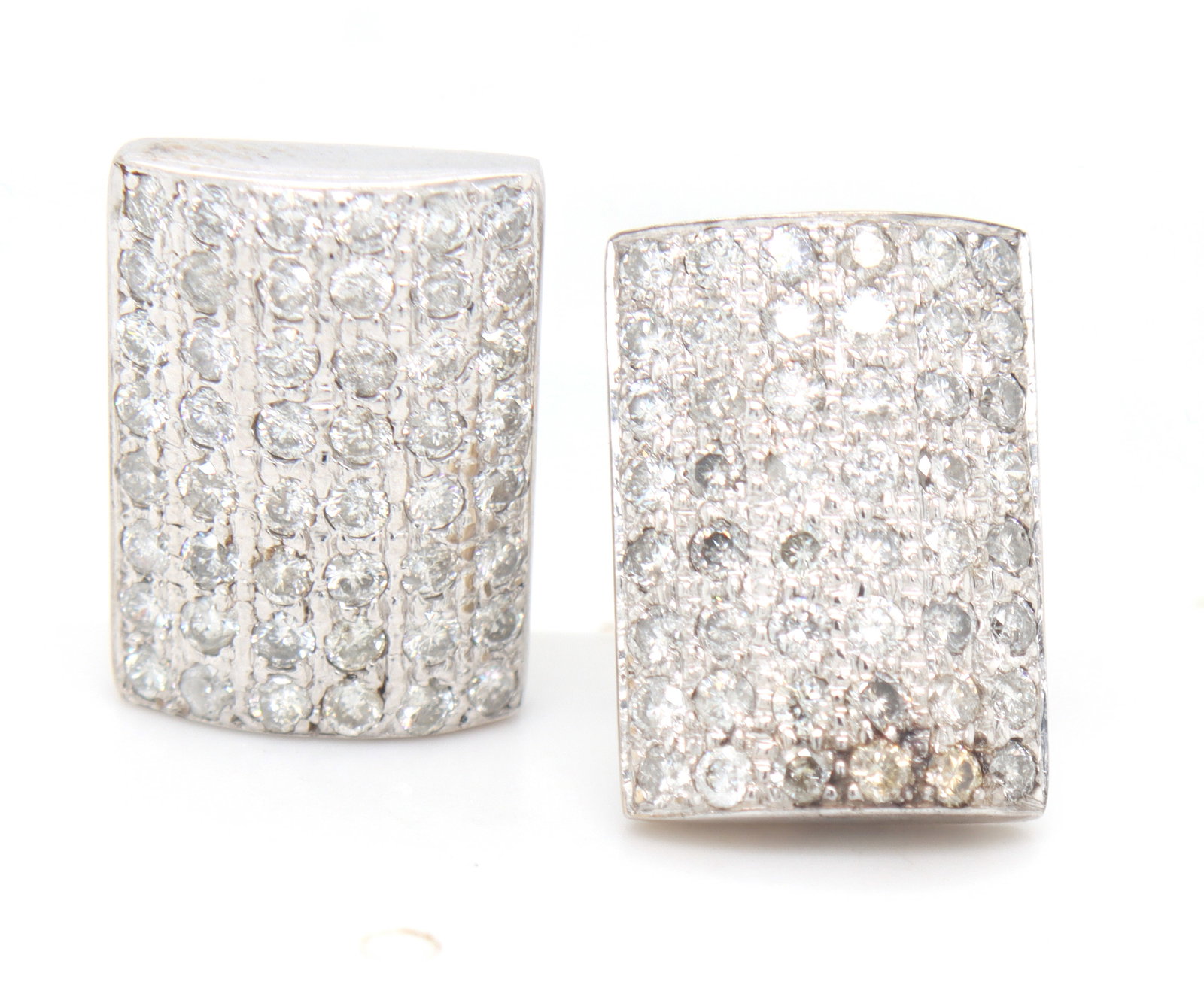 18kt White gold round brilliant cut pave diamond earrings: 18kt white Gold approximate 2ctw Round Brilliant Cut Pave Diamond Earrings. Color Q-R. Clarity I2-I3. Total weight of Earrings 8 Grams.