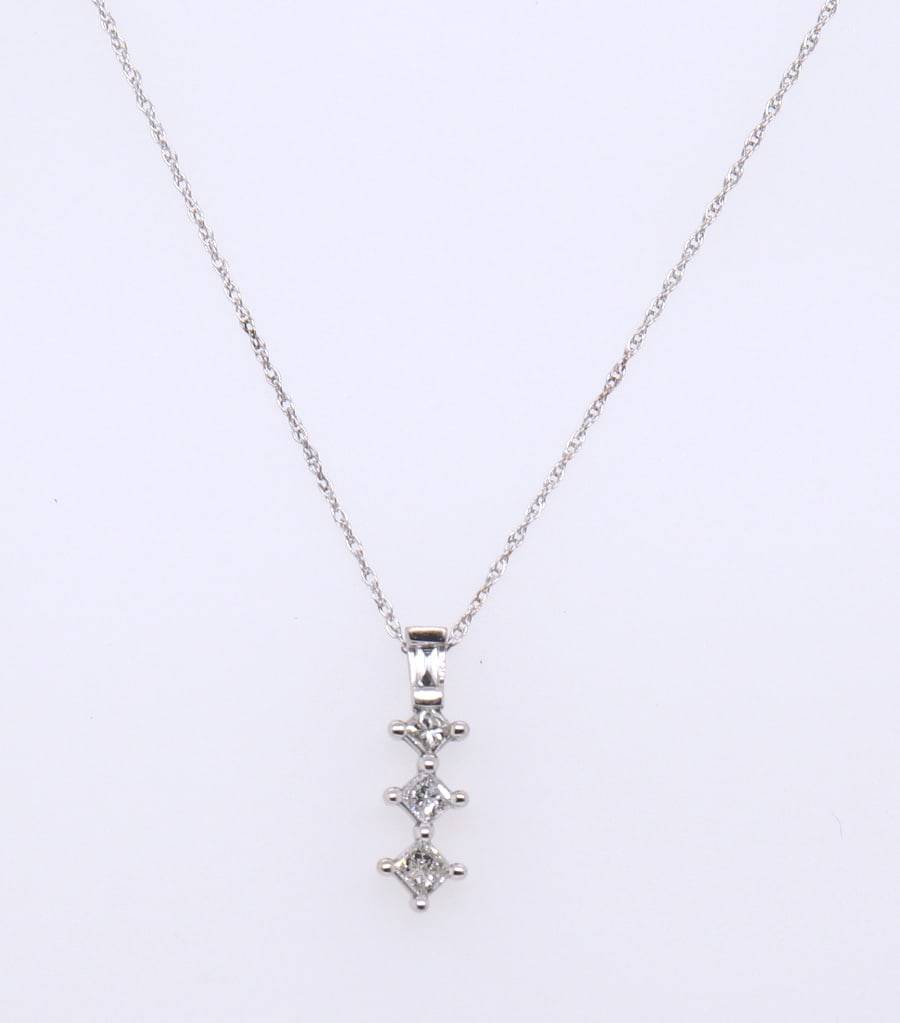 10kt White Gold Diamond Journey Pendant on Chain: 10kt White Gold approximate 0.15ctw Diamond Journey Pendant on 18-inch Rope Chain Necklace. The total weight of the Necklace is 1.60 Grams.