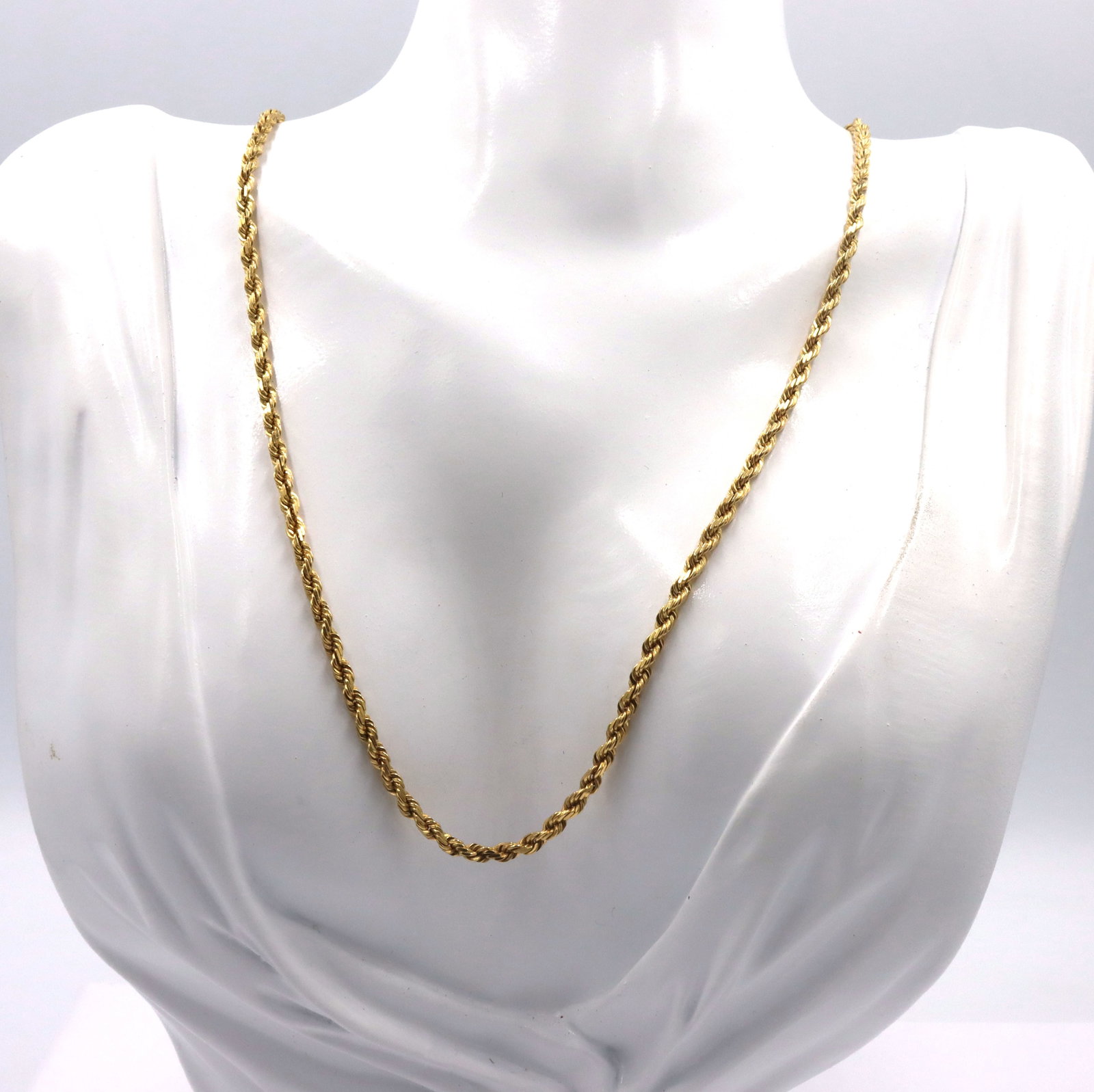 14kt Yellow gold rope chain necklace: 14kt Yellow gold rope 18-inch chain necklace. The total weight of the chain is 14.3 grams.