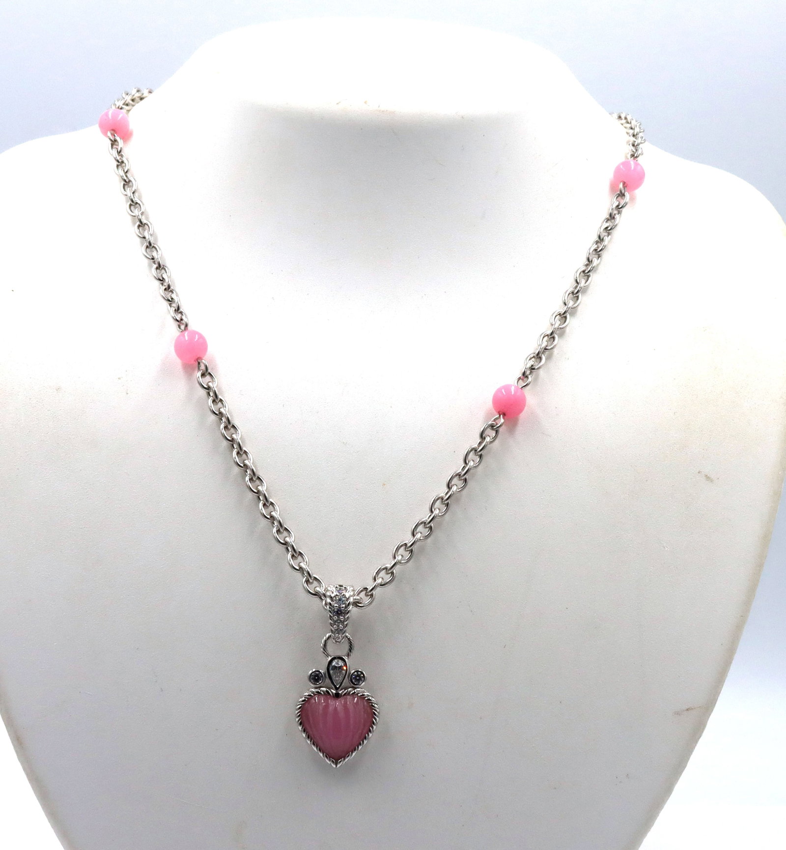 Judith Ripka pink chain necklace with pink heart enhancer: Signed Judith Ripka pink chain 18-inch necklace with pink heart enhancer in 925 sterling silver. The total weight of the necklace is 22.4 grams.