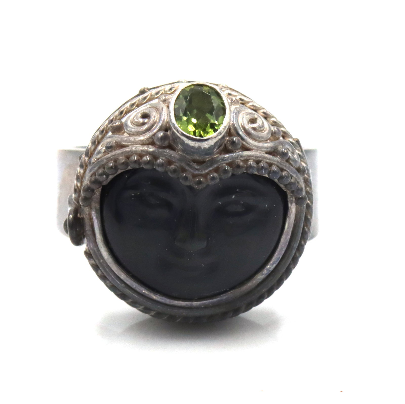 Vintage 925 sterling silver Sejan signed Goddess box ring with Peridot: Vintage 925 sterling silver Sejan signed Goddess box adjustable ring with Peridot. The total weight of the ring is 15.1 grams.