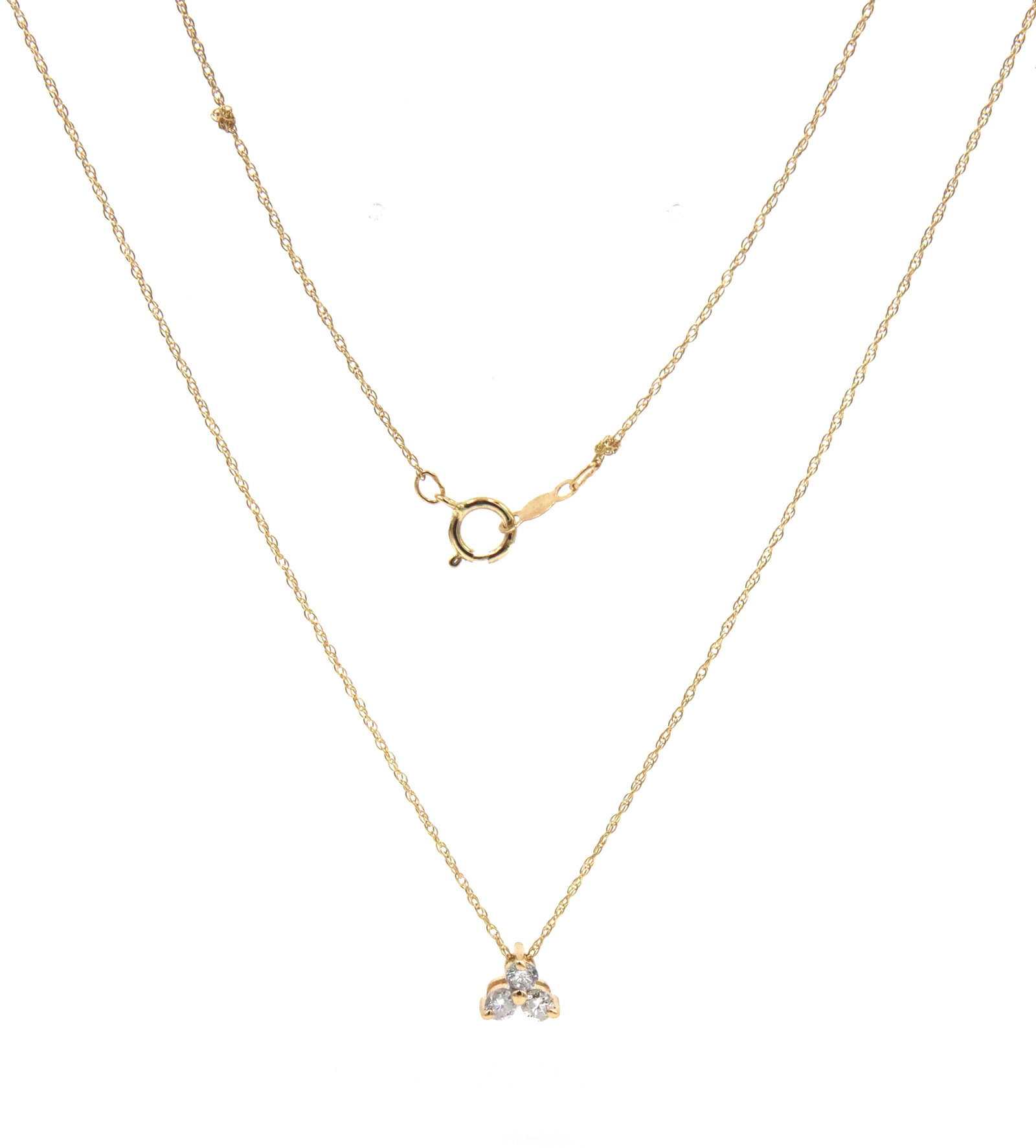 14kt Yellow gold 0.20ctw 3 diamond pyramid pendant on chain: 14kt Yellow gold approximate 0.20ctw 3 diamond pyramid pendant on 18-inch chain necklace with spring ring clasp. The total weight of the necklace is 1.20 grams.
