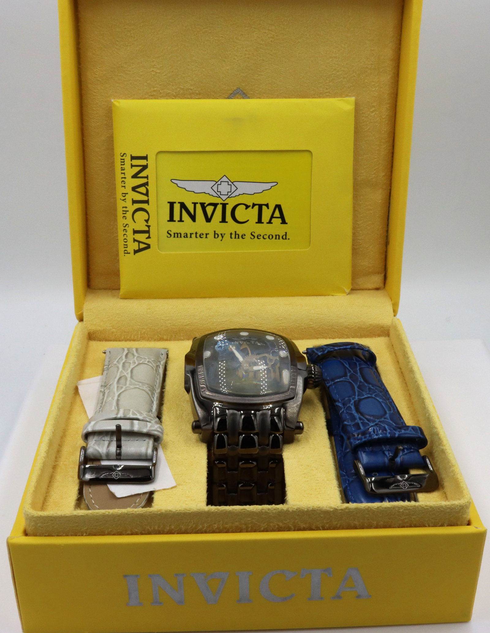 Invicta Lupah mechanical skeleton watch: Invicta Lupah mechanical skeleton 48mm stainless steel 8-inch watch. The total weight of the watch is 255.2 grams. Comes with box, booklet, extra links and 2 straps.