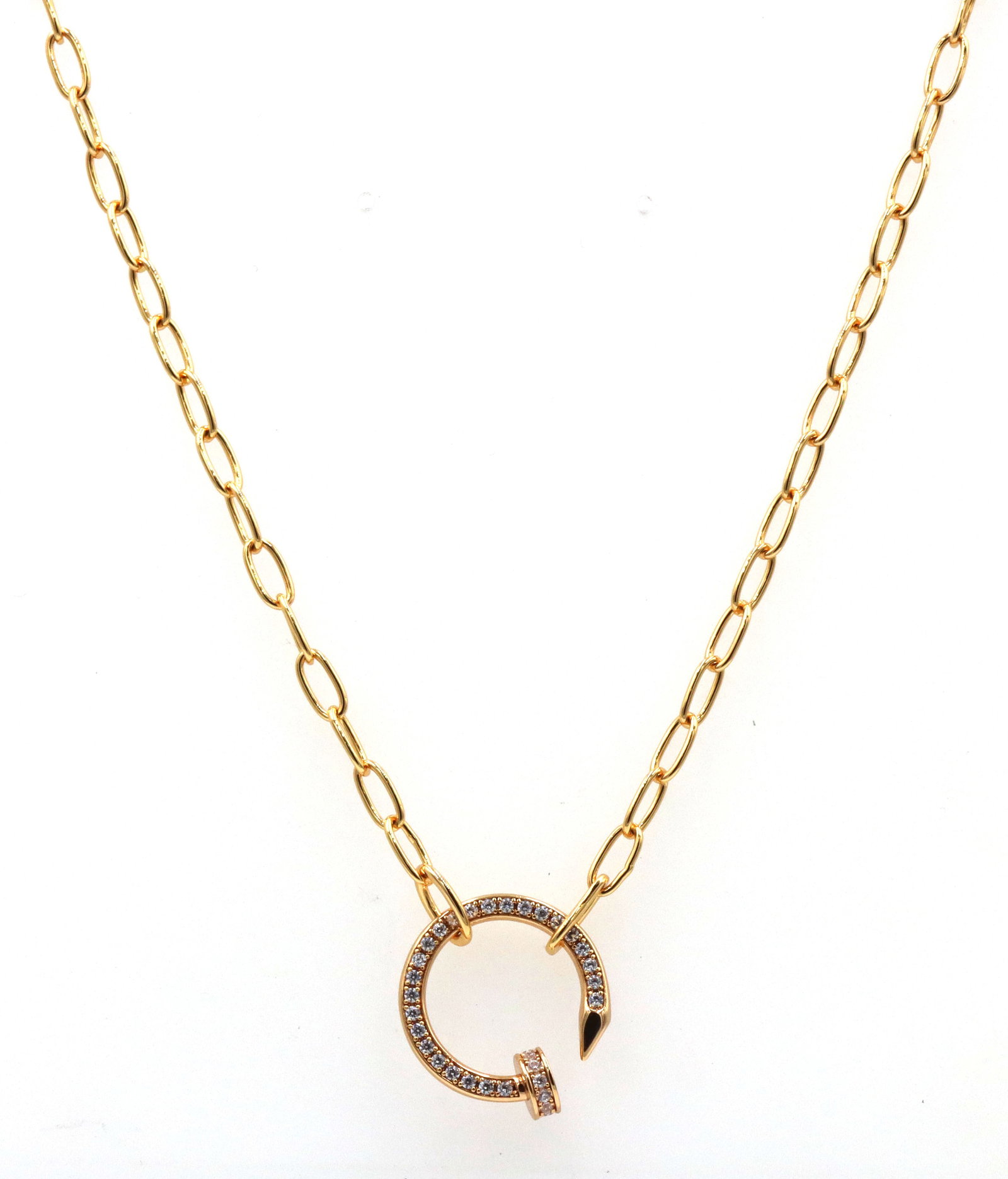 Gold plated crystal nail pendant on chain
