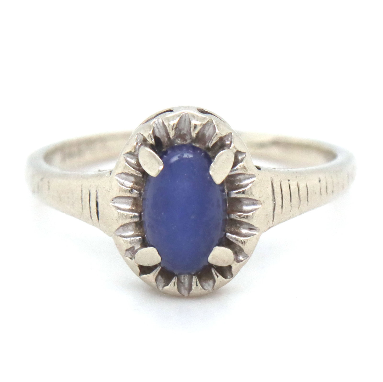 14kt White gold Linde star sapphire ring: 14kt White gold Linde star sapphire ring. The total weight of the ring is 1.5 grams. Ring size 3".