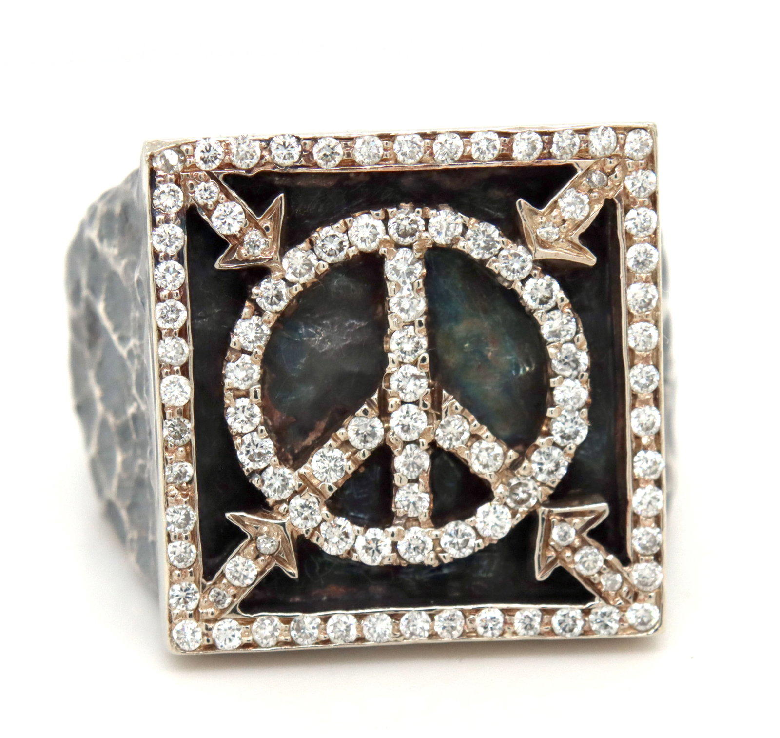 925 Sterling silver Hammered diamond peace ring: 925 Sterling silver Hammered diamond peace ring. The total weight of the ring is 33 grams. Ring size 14.5".