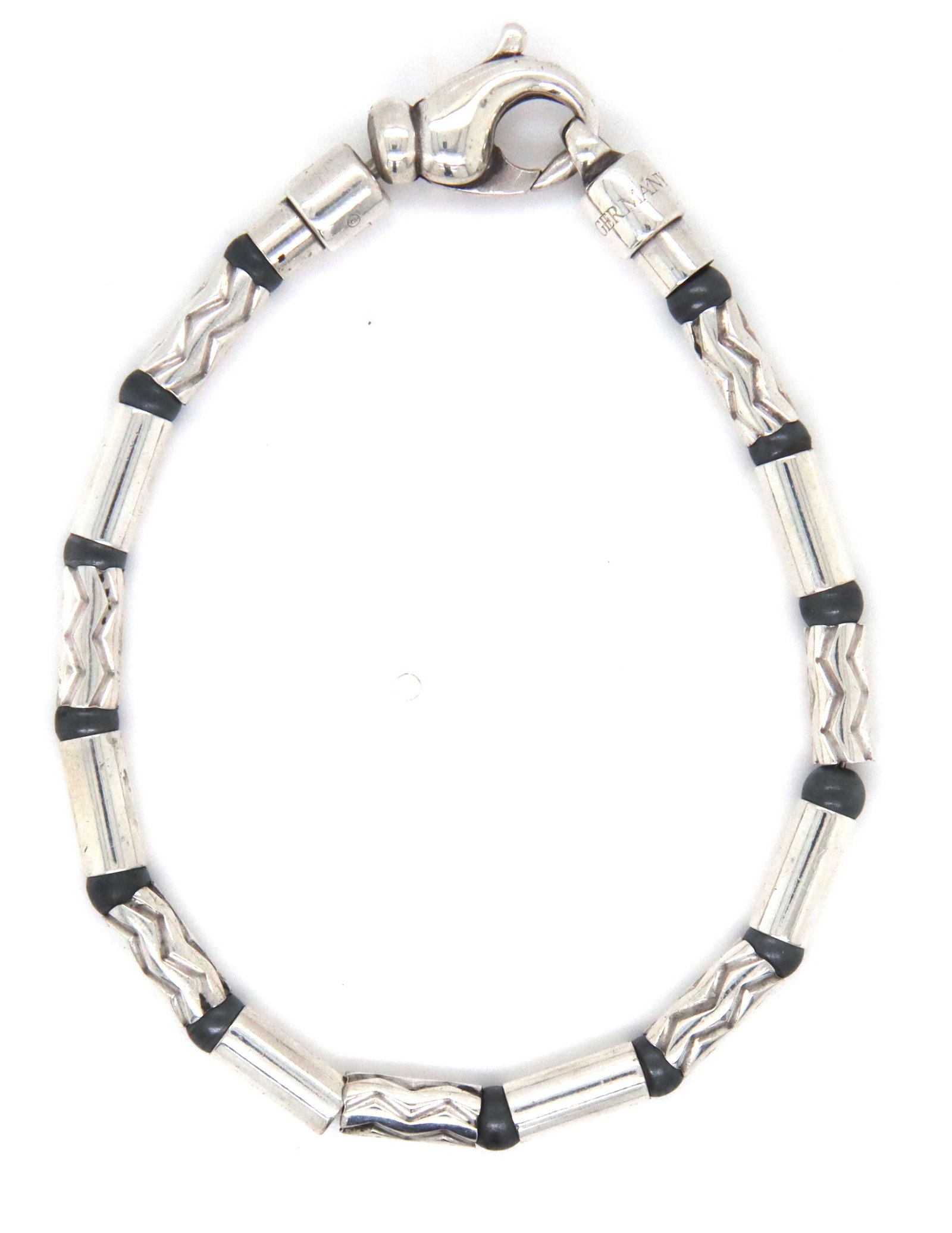 Tiffany & Co Aztec link bracelet: Tiffany & Co Aztec link 7-inch bracelet in 925 sterling silver. The total weight of the bracelet is 23.1 grams.