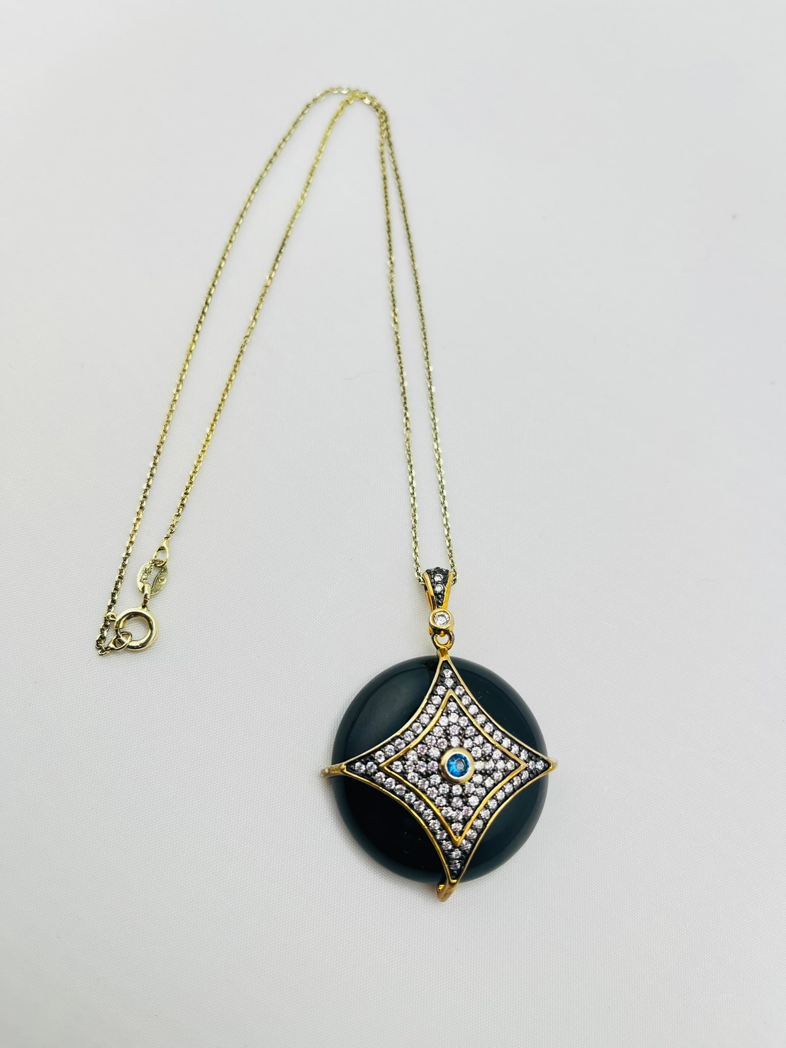 925 Black Rhodium Sterling Silver Black Onyx with Crystal Set Rhombus Overlay Pendant Necklace: 925 black rhodium sterling silver black onyx with crystal set rhombus overlay pendant with chain. 16.7 grams, 16 inch