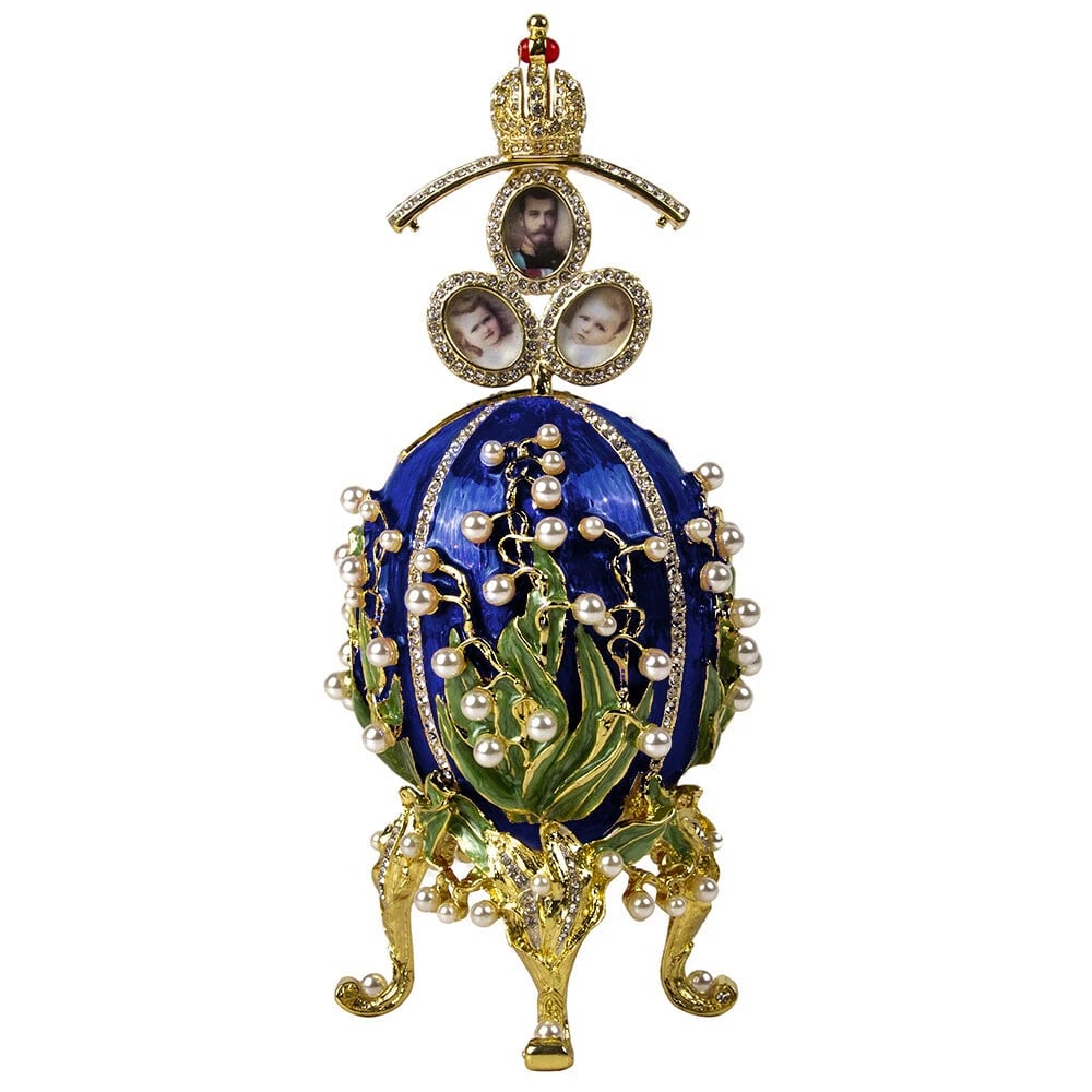 Blue Lily of the Valley Faberg? Egg Replica ? Perfect Easter or Collectible Gift: Celebrate artistry and elegance with this stunning?Blue Lily of the Valley Faberg? Egg Replica. Expertly crafted from metal, enamel, and crystal, this collectible piece features Swarovski crystal acce