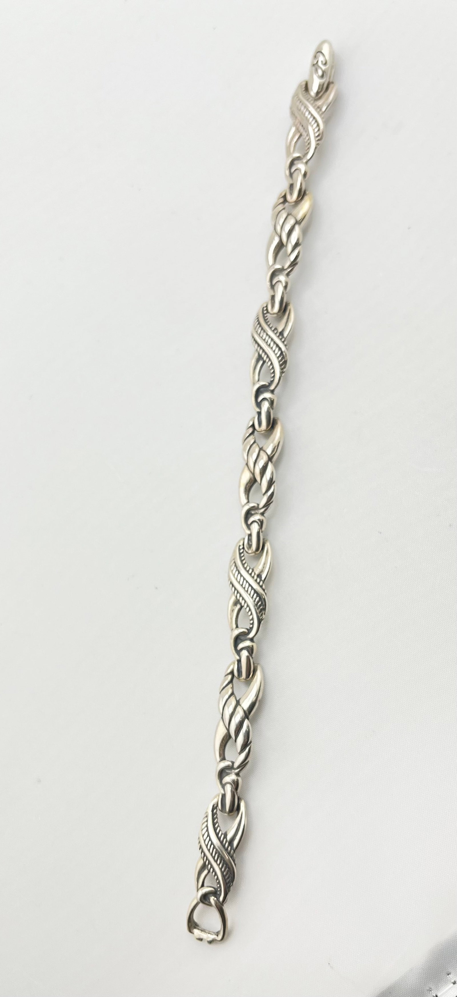 925 Sterling Silver Carolyn Pollack Vintage X-Link Infinity Interlocking Links Bracelet: 925 Sterling Silver Carolyn Pollack Vintage Twisted X link Bracelet . 21.8 grams. 8 inches