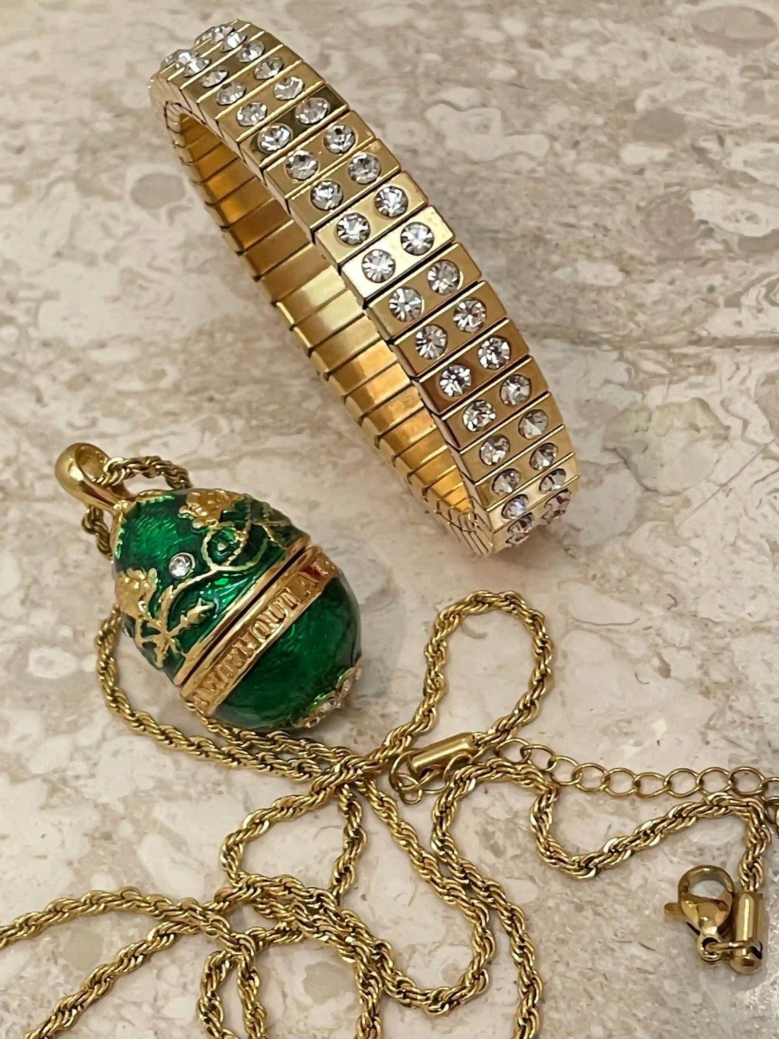 Imperial Green Egg Pendant & 24K Gold Accent Bracelet Set ? Handset Austrian Crystal Jewelry Collect: Step into timeless elegance with this opulent egg-inspired jewelry set, designed for women who appreciate artistry, symbolism, and luminous detail. Inspired by legendary European court jewels, this ha