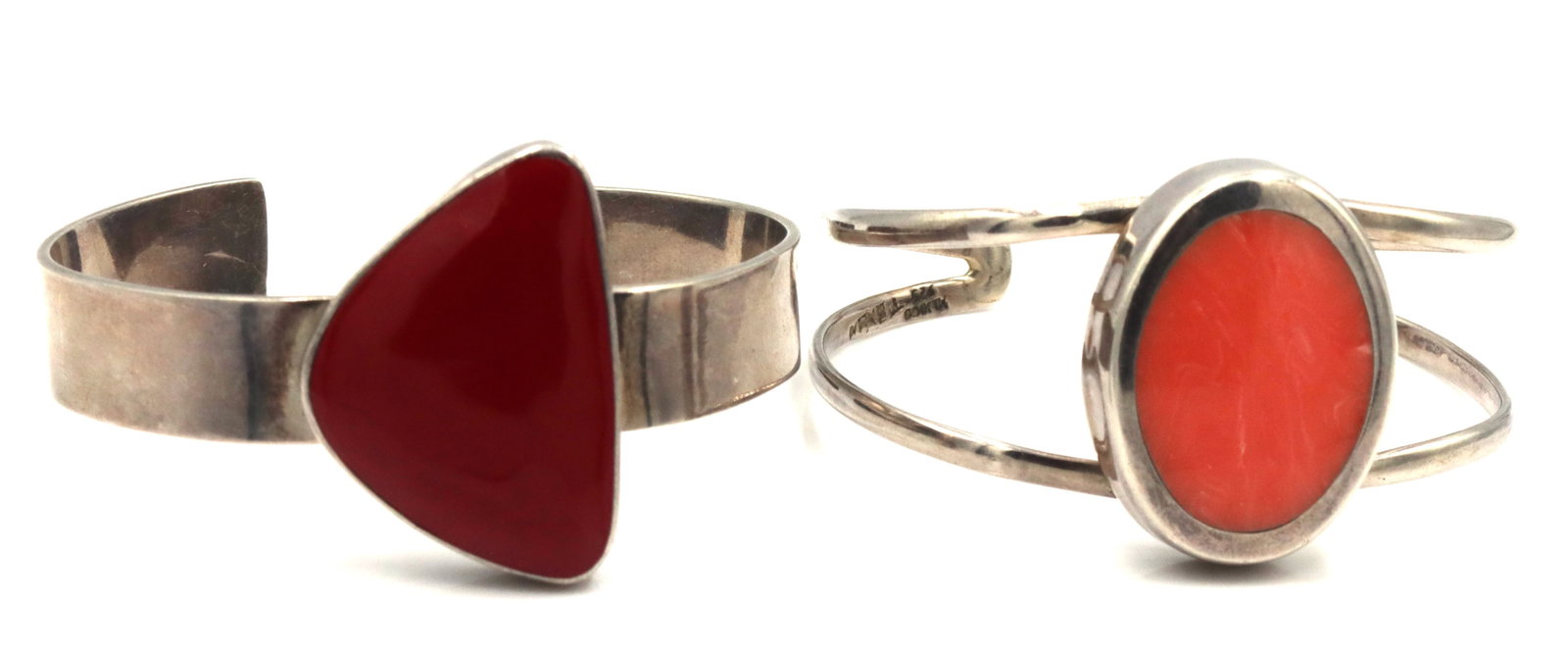 Lot of 2 Vintage 925 sterling silver Coral cuff bangles: Lot of 2 Vintage 925 sterling silver Coral cuff bangles. The total weight of the lot is 53.9 grams.