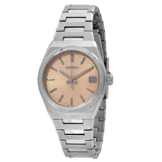 Seiko Classic Women?s Quartz Watch ? Salmon Dial, Stainless Steel Bracelet, 34mm: A refined and versatile timepiece from Seiko, designed with understated elegance and everyday practicality in mind. The warm salmon dial adds a distinctive touch, complemented by sleek silver-tone han