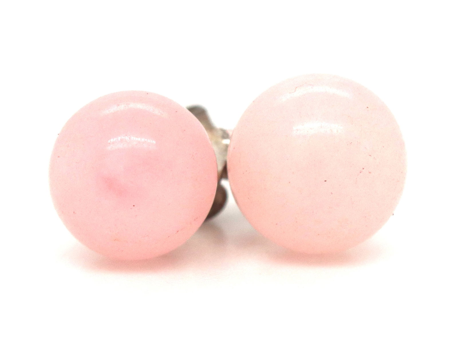 925 Sterling silver Rose quartz stud earrings: 925 Sterling silver Rose quartz stud earrings. The total weight of the earrings is 1.69 grams.