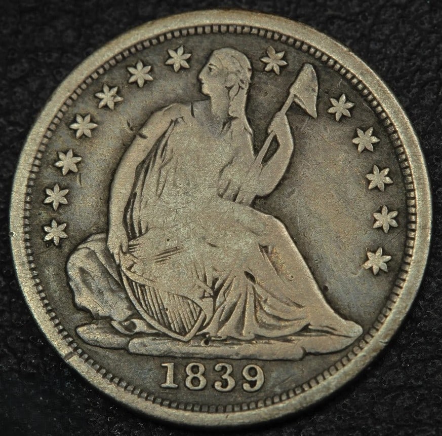 1839-O Seated Liberty Half Dime Early New Orleans Silver Coin: 1839-O Seated Liberty Half Dime, No Drapery variety, struck at the historic New Orleans Mint. This early United States silver coin features the classic Seated Liberty design on the obverse and wreath 