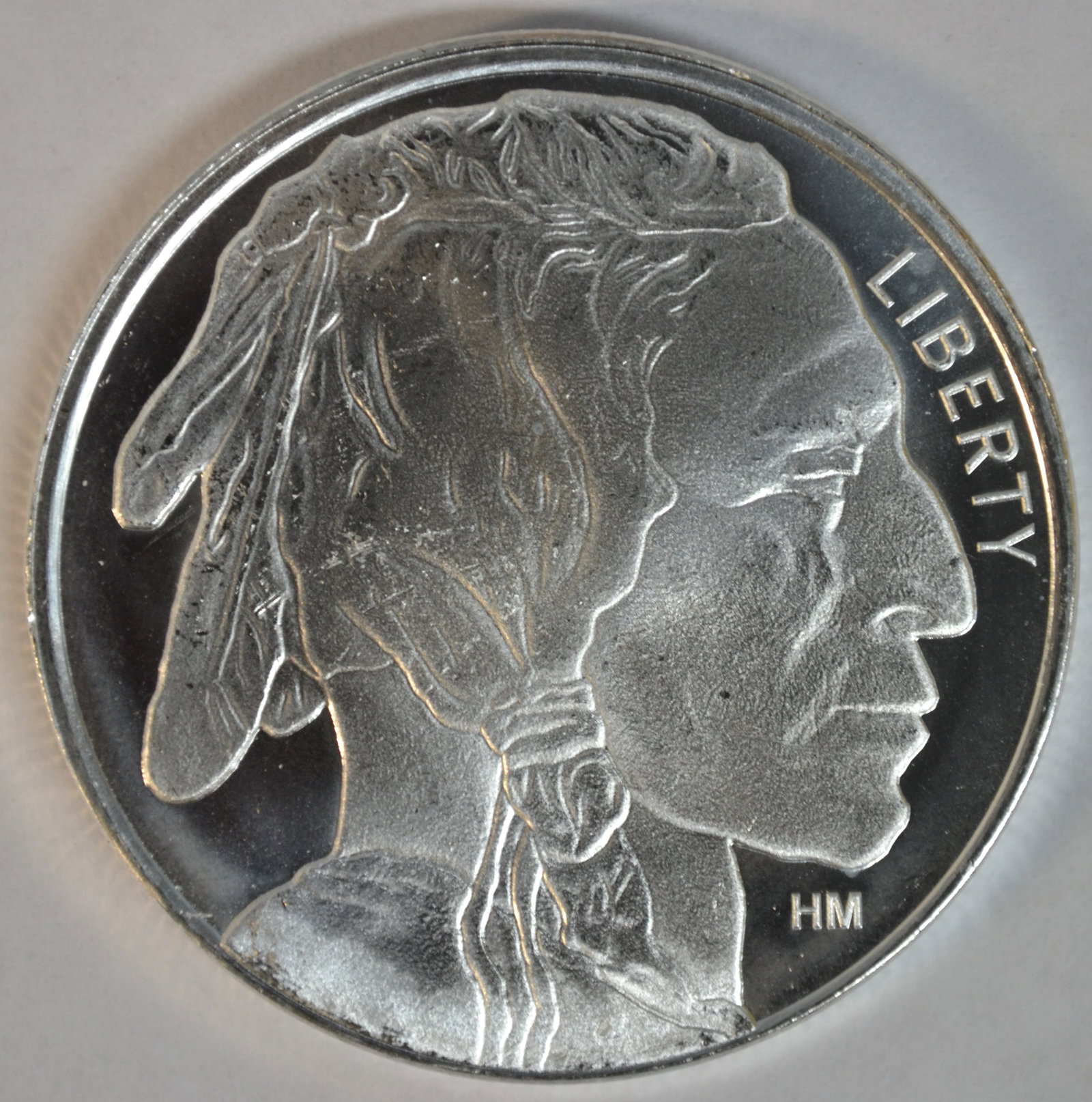 Indian Head Buffalo Design Classic Bullion 1 oz .999 Fine Silver Round: This 1 oz silver round features the iconic Indian Head Buffalo design, one of the most recognized and sought-after motifs in precious metals. Struck in .999 fine silver, this round offers both intrins