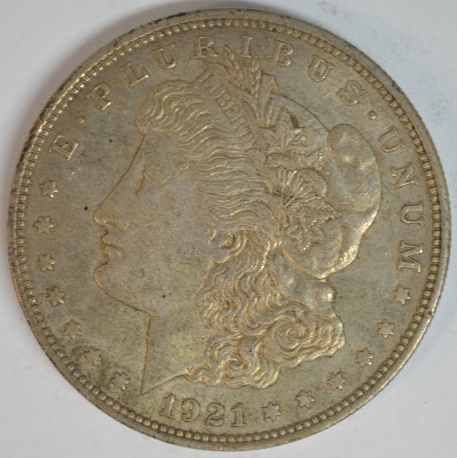 1921 Morgan Silver Dollar Philadelphia Mint Better Circulated Example: 1921 Morgan Silver Dollar, the final year of the famous Morgan Dollar series that was originally struck from 1878 through 1904 before returning for one final year in 1921. Very Fine (VF-25) Details. T