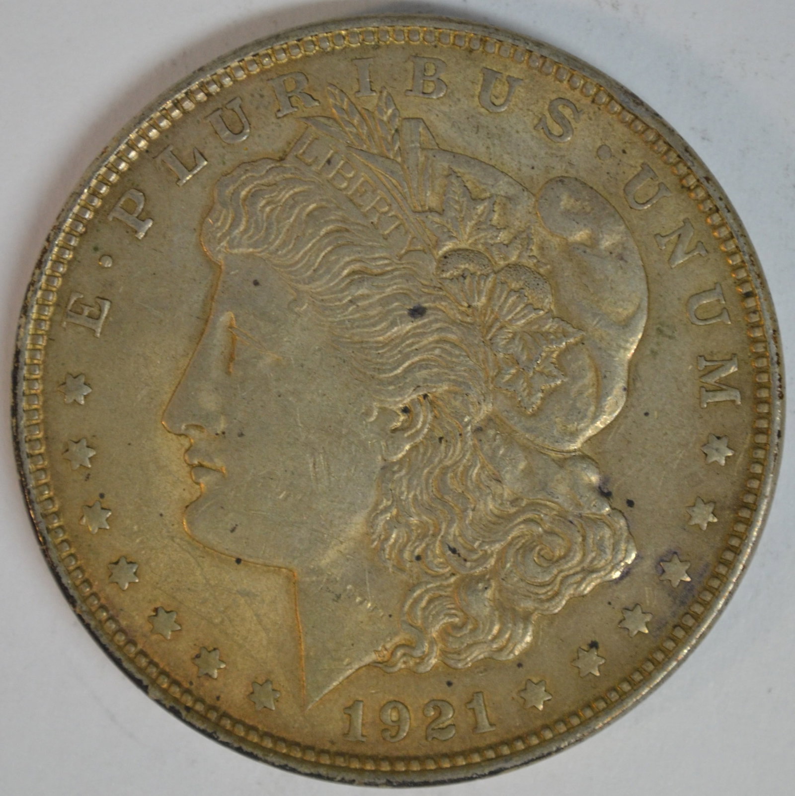 1921 Morgan Silver Dollar Better Detail with Original Silver Surfaces Circulated Example: 1921 Morgan Silver Dollar, the final year of the iconic Morgan Dollar series before the introduction of the Peace Dollar later that same year. Struck in 90% silver, this historic U.S. coin remains one