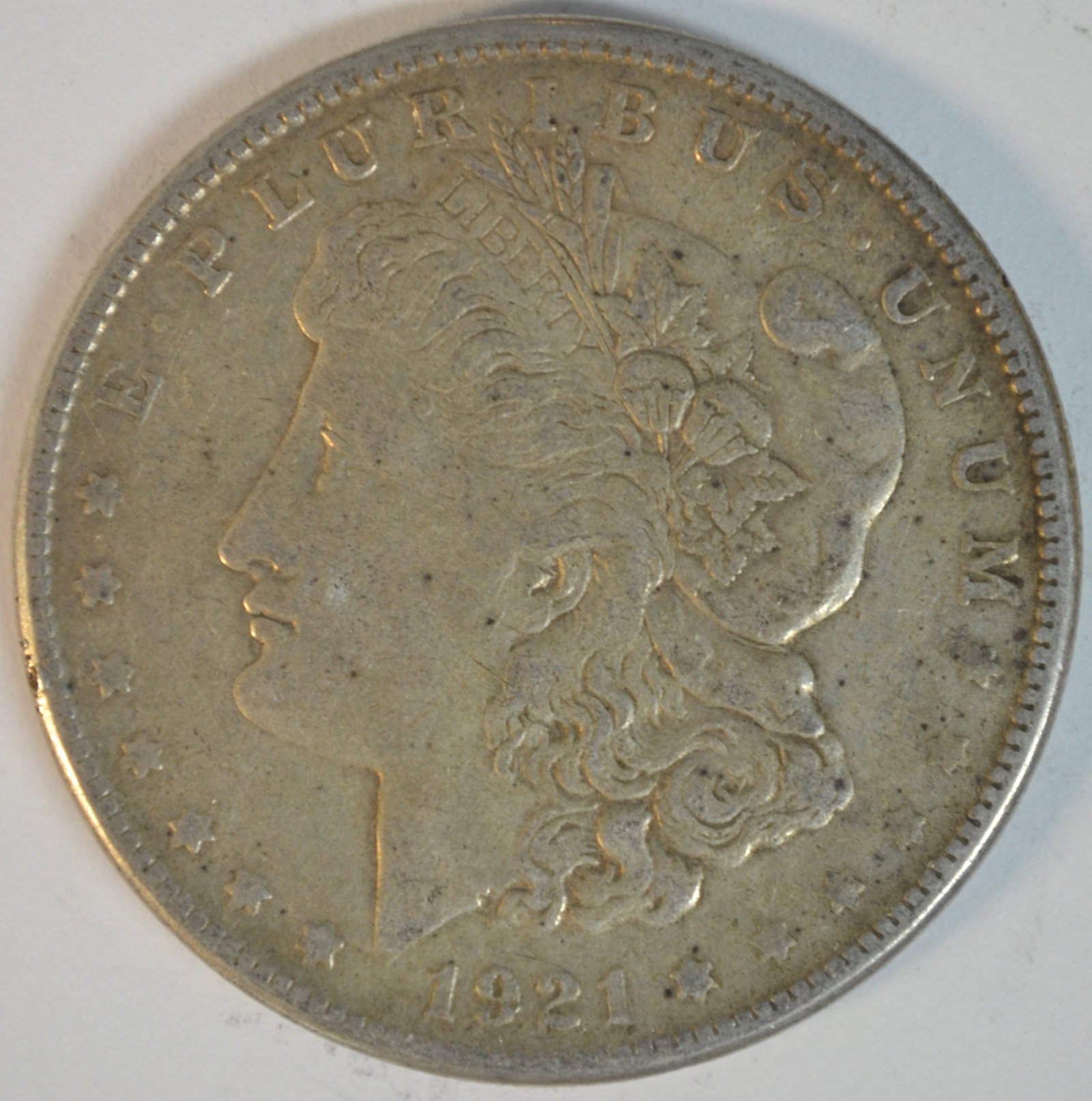 1921-S Morgan Silver Dollar San Francisco Mint Better Circulated Example: 1921-S Morgan Silver Dollar, struck at the San Francisco Mint during the final year of the beloved Morgan Dollar series. Composed of 90% silver and 10% copper, this classic American silver dollar