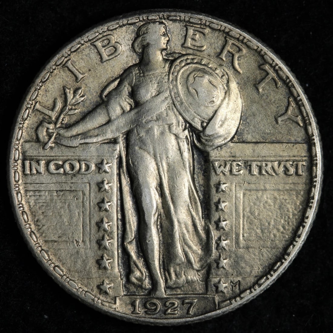 1927 Standing Liberty Quarter Philadelphia Mint Fine (F-12) Details 90% Silver U.S. Coin: 1927 Standing Liberty Quarter, one of the most iconic and beautiful designs in American numismatics. Designed by Hermon A. MacNeil, the Standing Liberty Quarter was produced from 1916 through 1930 and