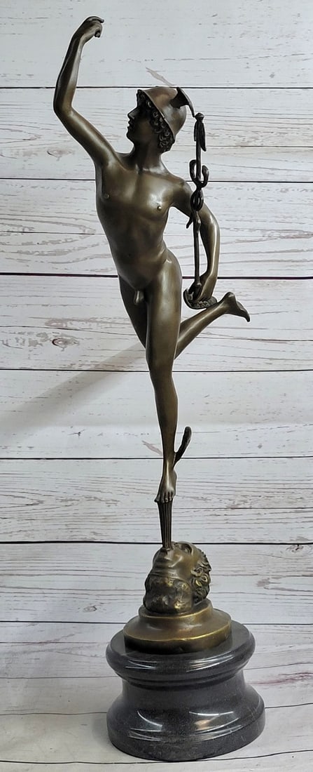 Roman Flying Mercury Bronze Figure: He is depicted wearing a winged Pegasus on his head and winged sandals which give him speed in flight. He carries the caduceus in his hand, the staff was given to him by Apollo that has come to