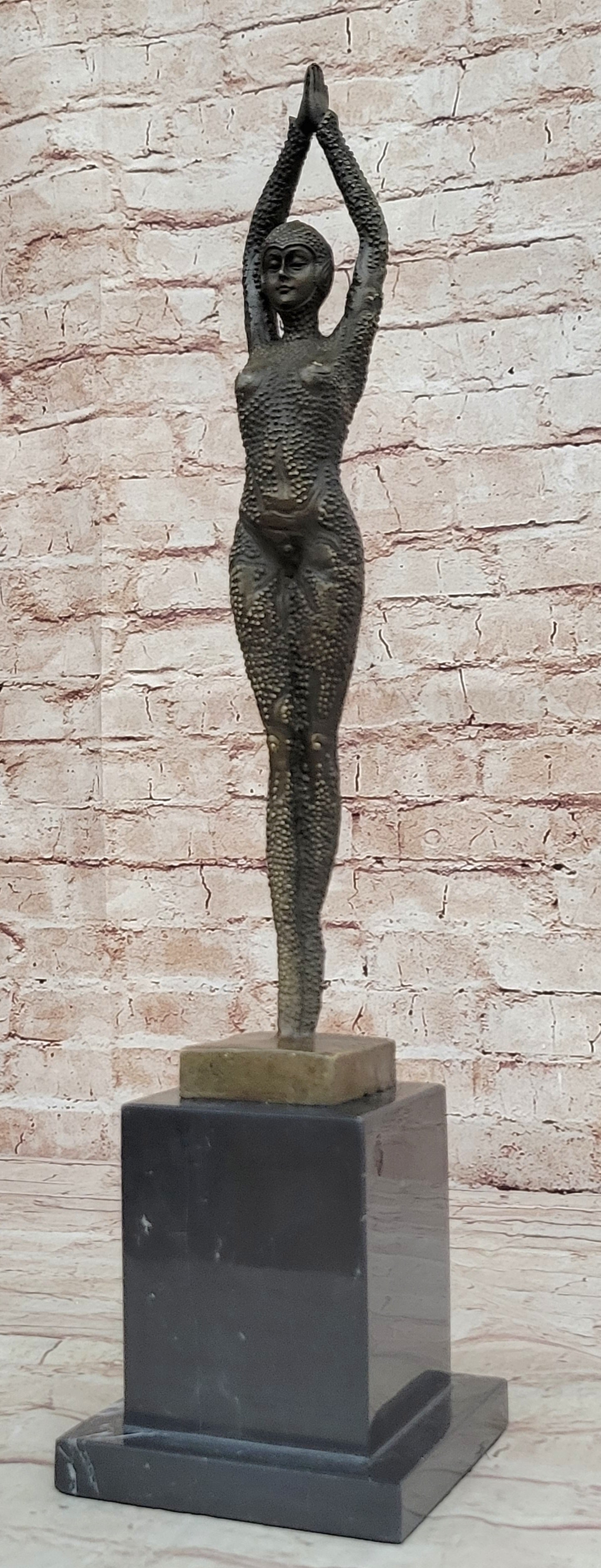 Dancer Bronze Statue: Another stunning piece to collect decorates and behold in your abode or office. only the highest quality in patina is used to last generations and the brown flesh tones are actually the amazing