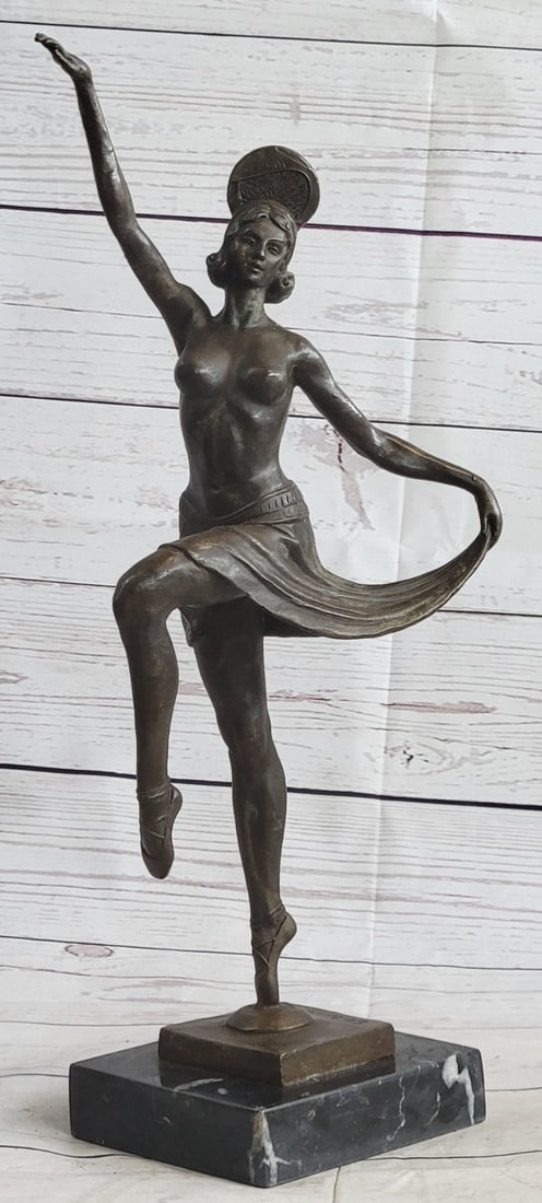 Dancer Ballerina Bronze Sculpture: This spectacular early 20th c French reproduction bronze was made by Henri (Enrique) Molins-Ballester (1893-1958). It depicts an iconic Art deco dancer in motion with one of her legs kicked upward and