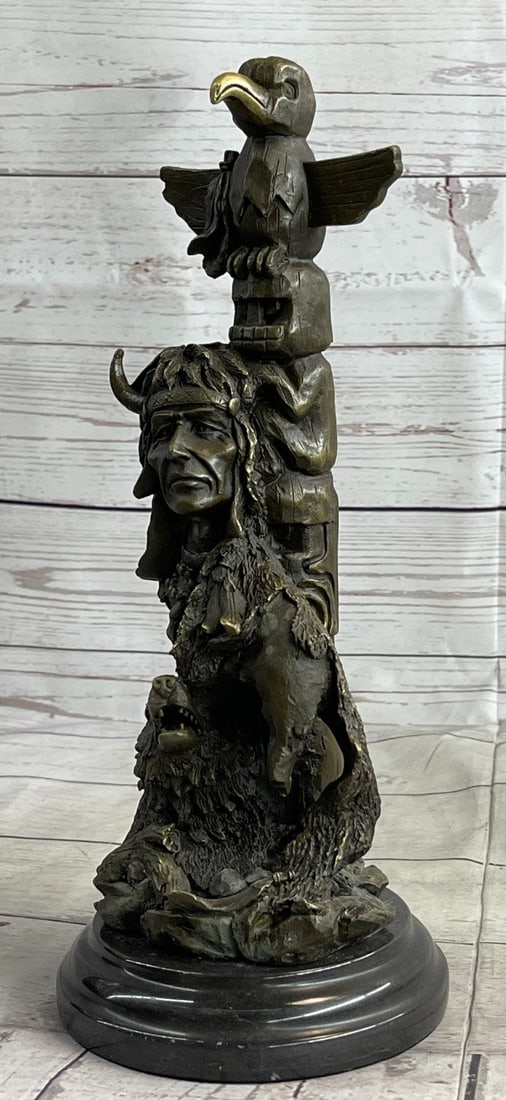 Legend Indian Chief with Wolf and Eagle Bronze Sculpture: Legend tells us that Indians and wolves once lived in such harmony that their spirits aligned in life and even in the hunt. The artist recaptures the moment when the chief, scout, and wolf scan and