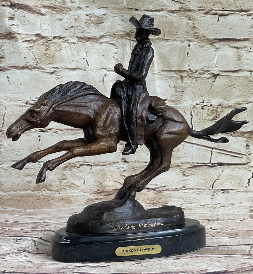 Cowboy Horse Bronze Sculpture: Western Bronze Sculpture, title tag reading Cowboy with a Rope on a rectangular black marble base. A seasoned cowboy courageously rides his wild horse. He is bucked by his uncontrollable stallion but