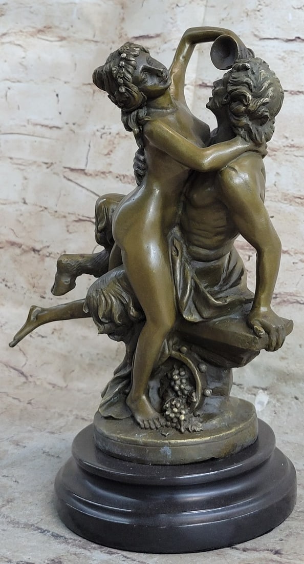 Nude Erotic Nymph with Satyr Bronze Sculpture: Humans sometimes say We are just animals. But we never think about what that means. The ancient Greeks did, creating a whole pantheon of composite creatures that were part human and part beast. These